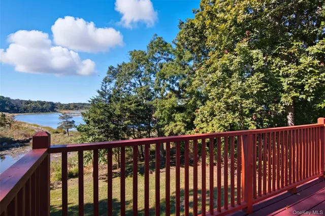a spacious bedroom with a large bed and a window