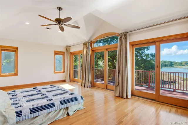 a view of balcony with wooden floor