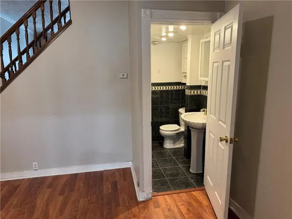 a bathroom with a sink and toilet