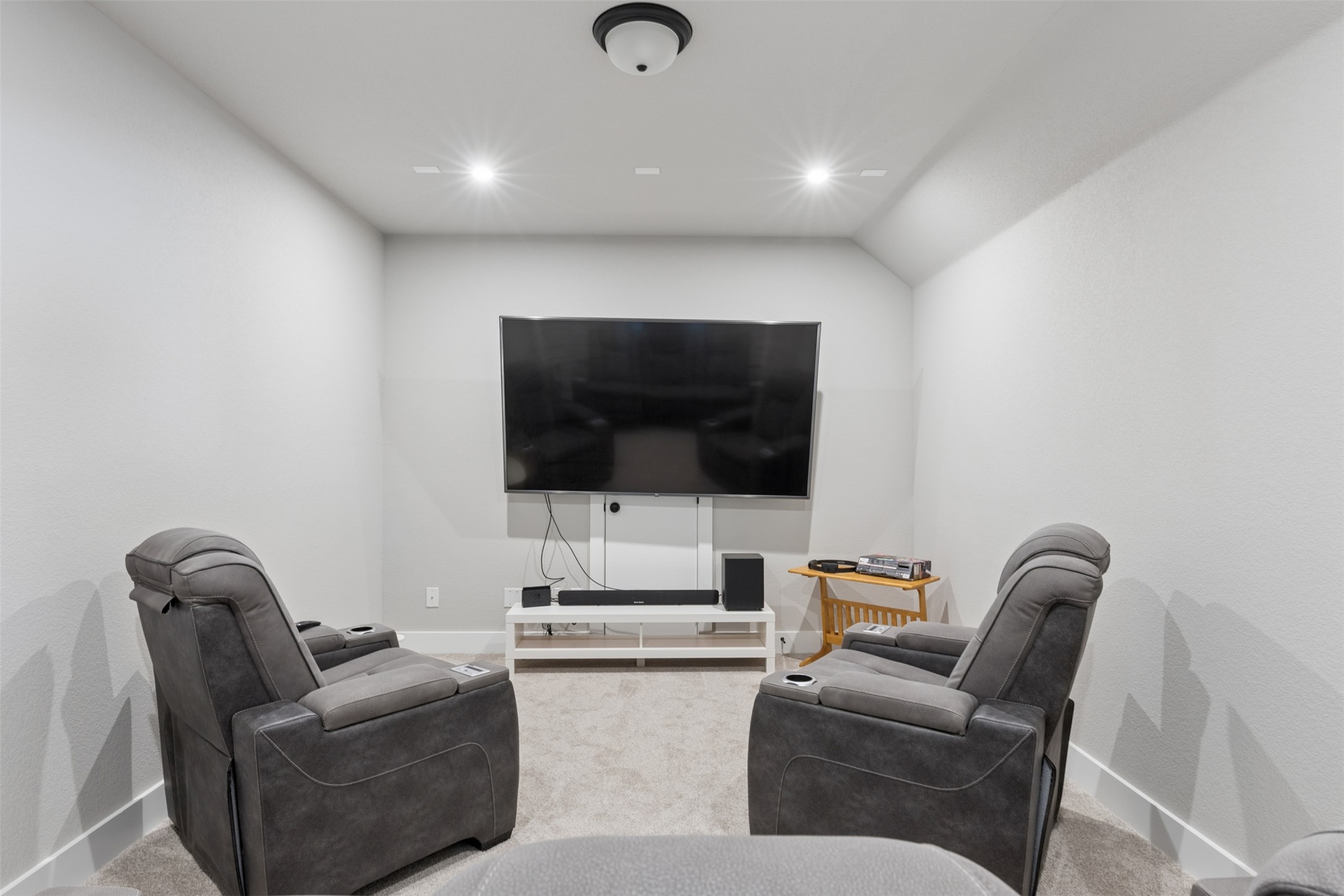 1508 Cardinal Lane Round Rock, TX 78681 - Photo 27 of 35 Carpeted living room with recessed lighting