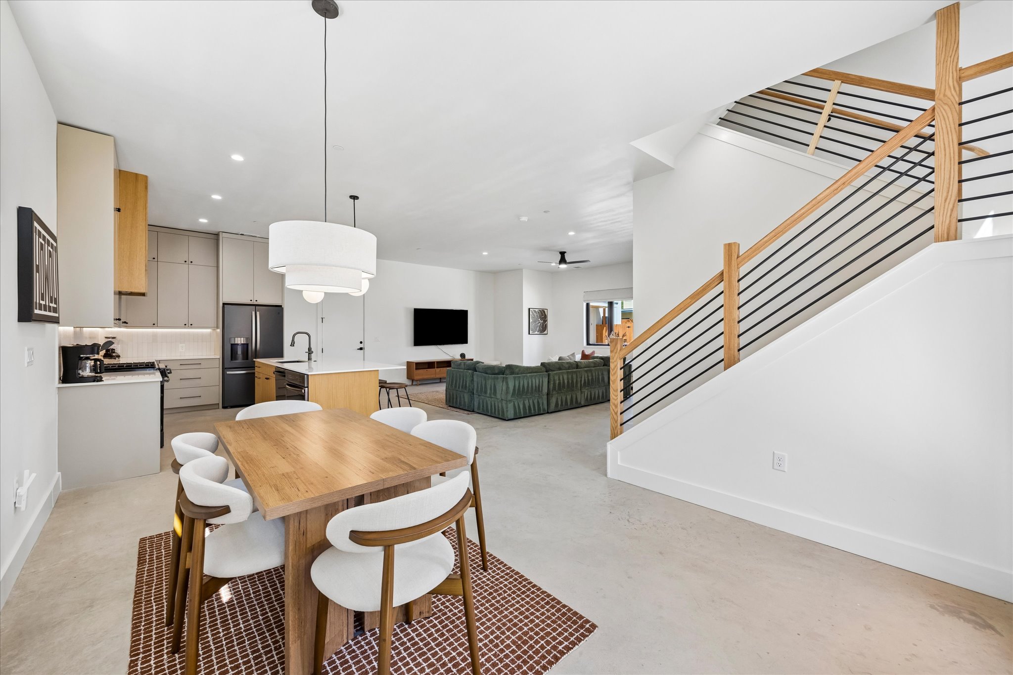 4416 South 1st Street, Unit 2 Austin, TX 78745 - Photo 12 of 33 an open kitchen with dining table and chairs