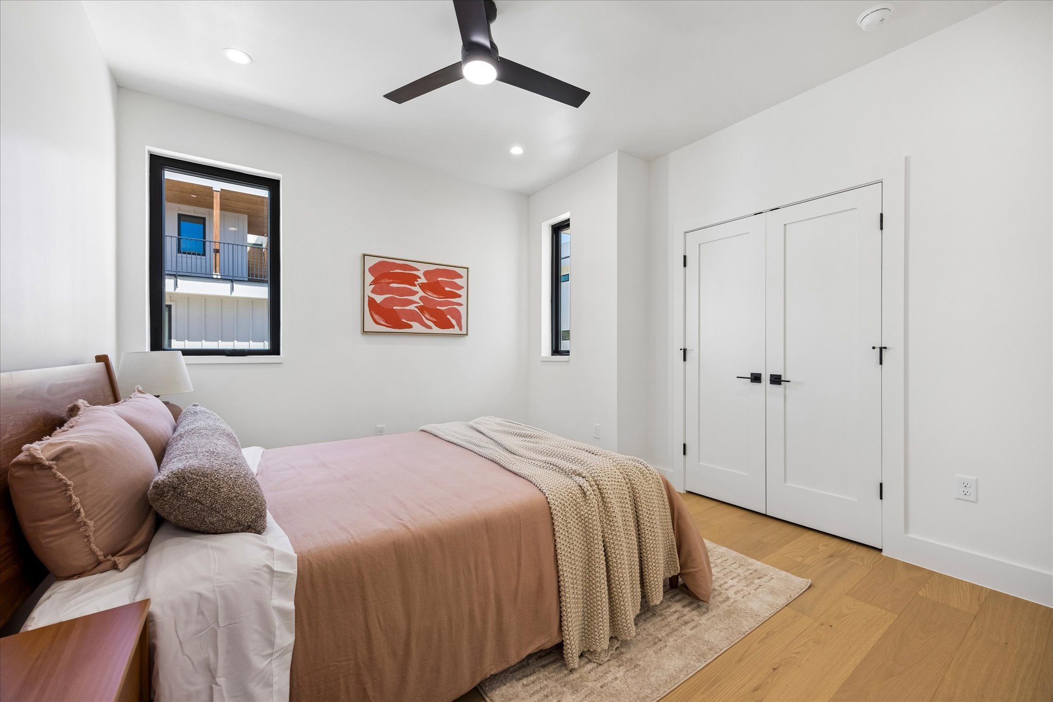 4416 South 1st Street, Unit 2 Austin, TX 78745 - Photo 14 of 33 a bedroom with a bed and a painting