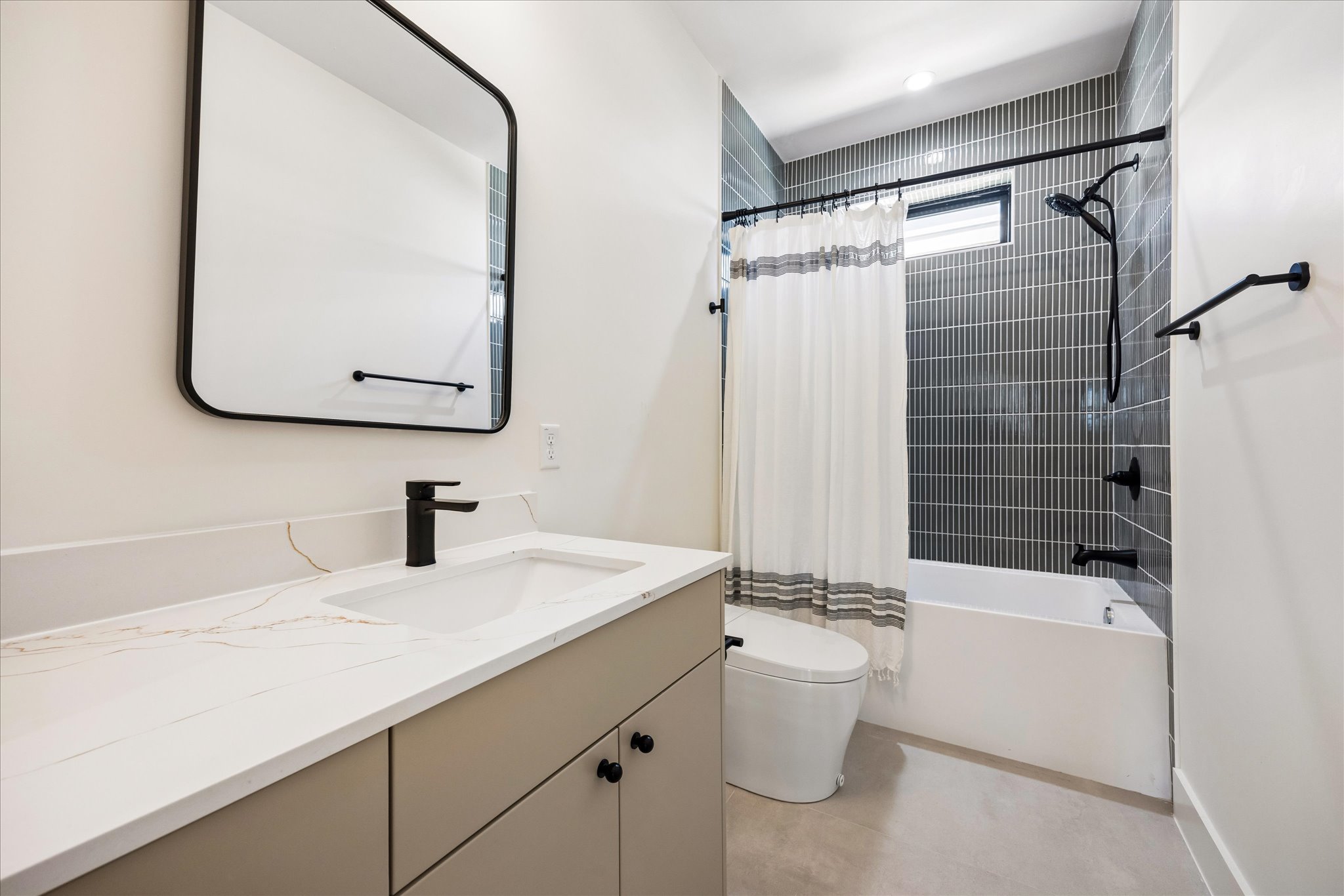 4416 South 1st Street, Unit 2 Austin, TX 78745 - Photo 15 of 33 a bathroom with a sink toilet and shower