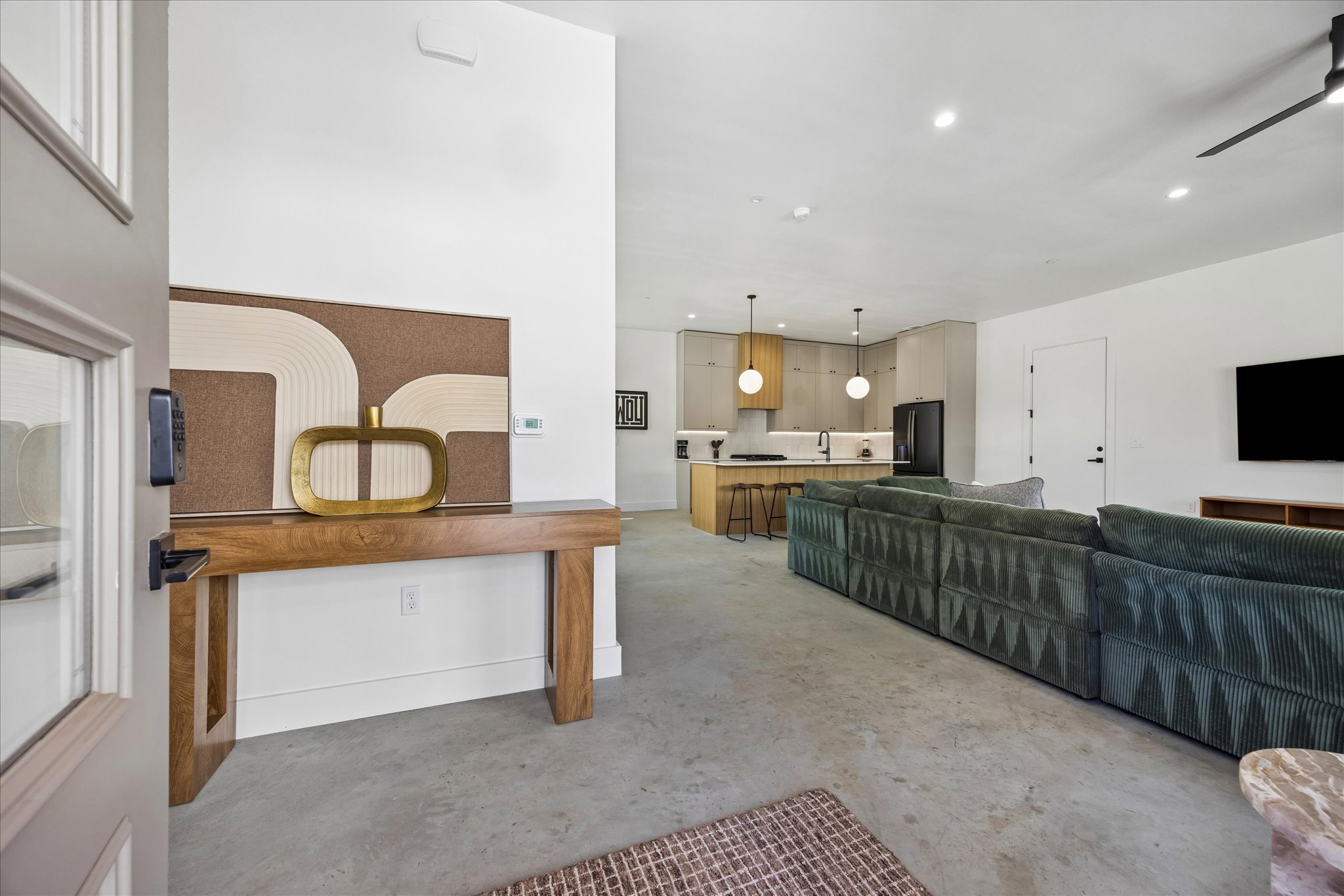 4416 South 1st Street, Unit 2 Austin, TX 78745 - Photo 2 of 33 a kitchen with stainless steel appliances granite countertop a stove a sink and a microwave