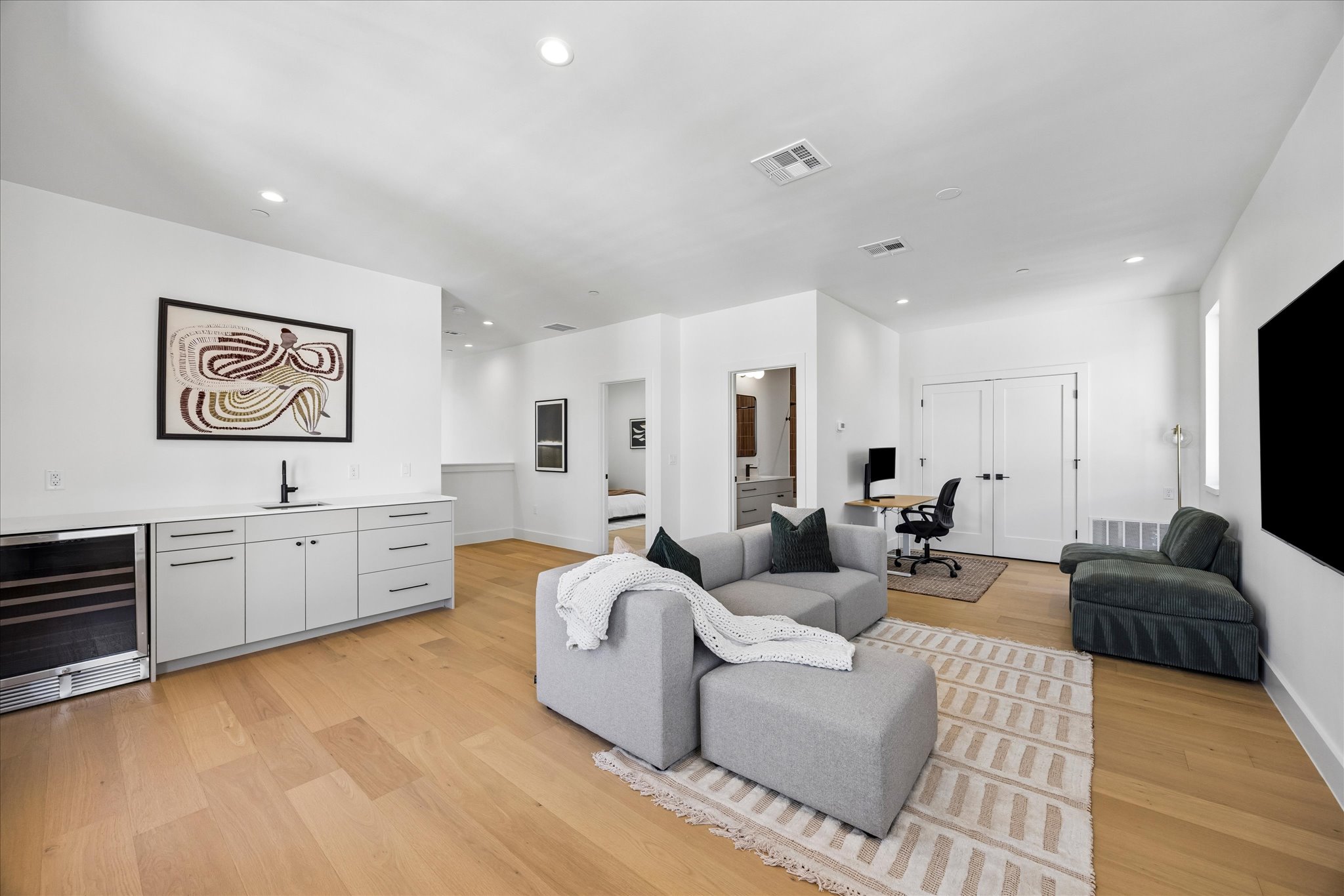 4416 South 1st Street, Unit 2 Austin, TX 78745 - Photo 25 of 33 a living room with furniture and a flat screen tv