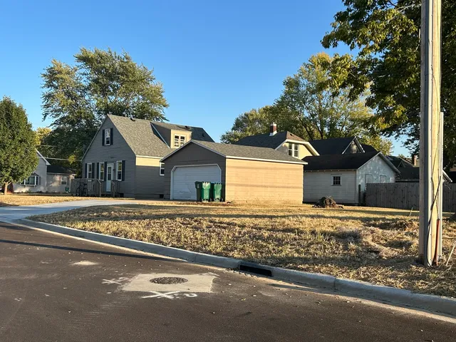 front view of a house with a street