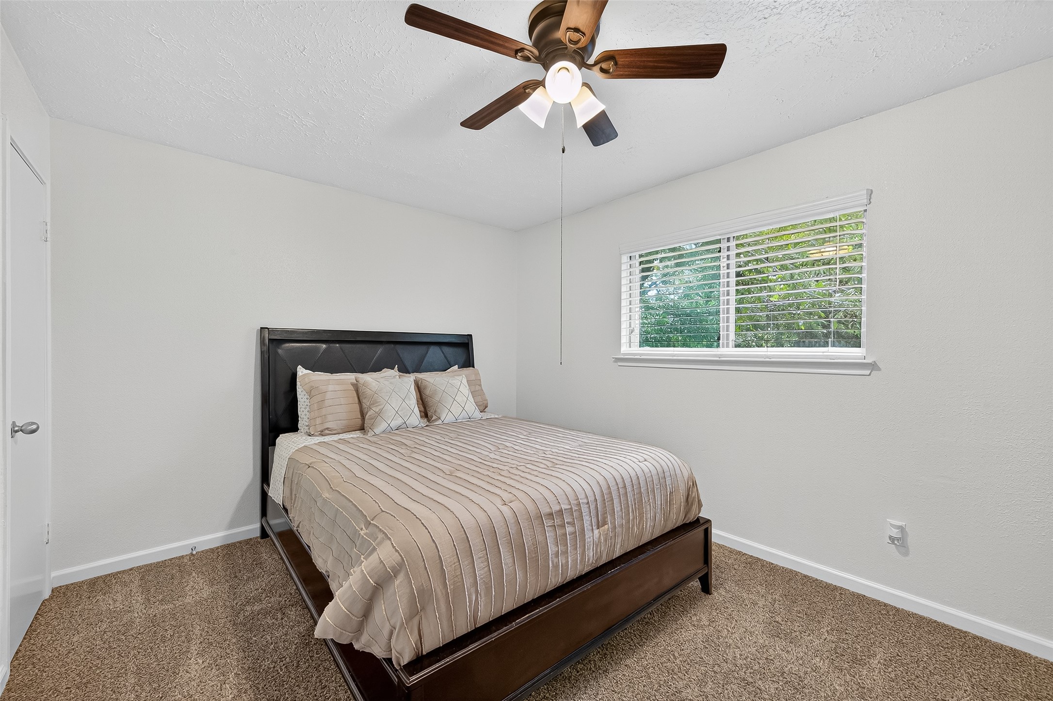5323 Windsong Trail Houston, TX 77084 - Photo 21 of 30 Bedroom #2 is spacious and offers a generous sized closet.
