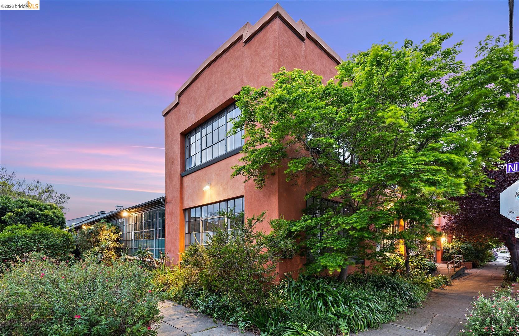 2512 Ninth Street, Unit 10 Berkeley, CA 94710 - Photo 1 of 1 front view of a house with a tree