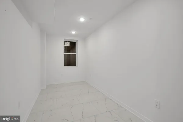 a view of a big room with a bathroom