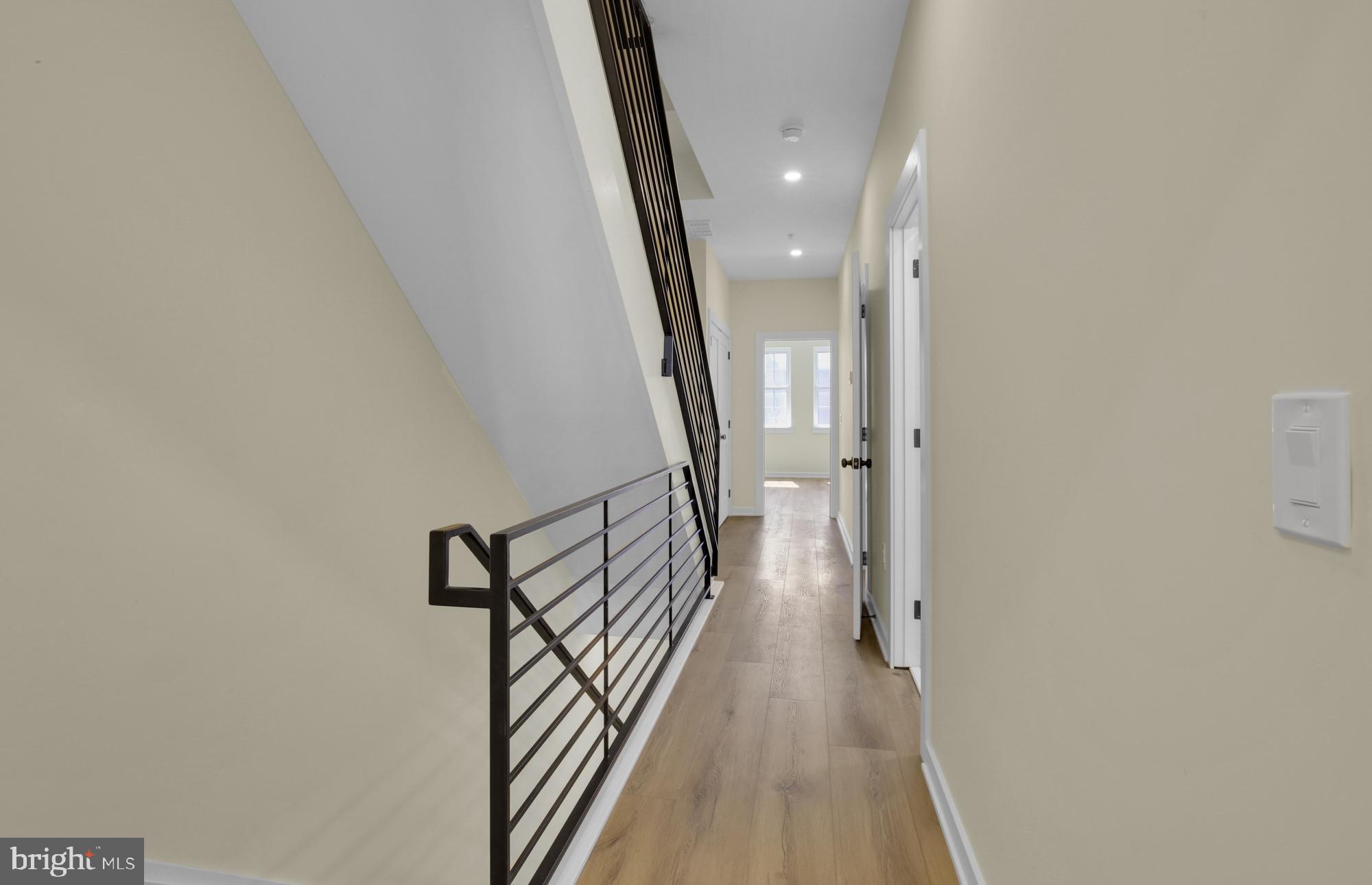 2670 Braddock Street Philadelphia, PA 19125 - Photo 19 of 47 a view of a hallway with wooden floor and staircase