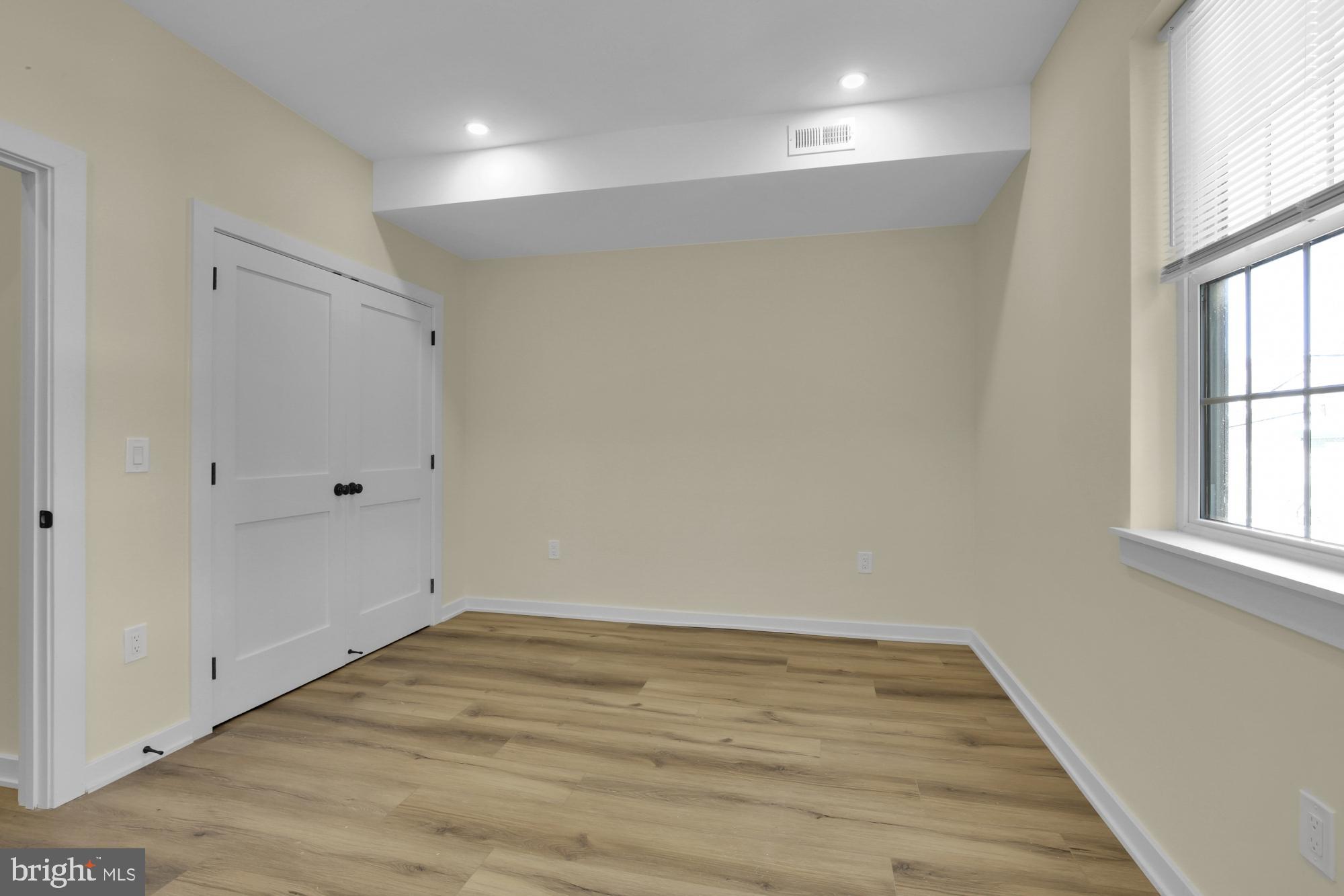 2670 Braddock Street Philadelphia, PA 19125 - Photo 21 of 47 a view of room with window and wooden floor