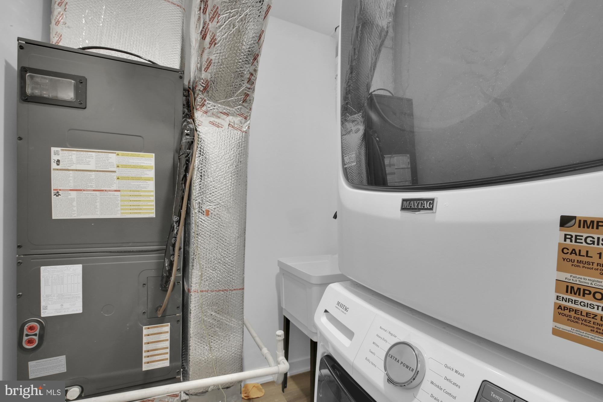 2670 Braddock Street Philadelphia, PA 19125 - Photo 26 of 47 a utility room with dryer and washer
