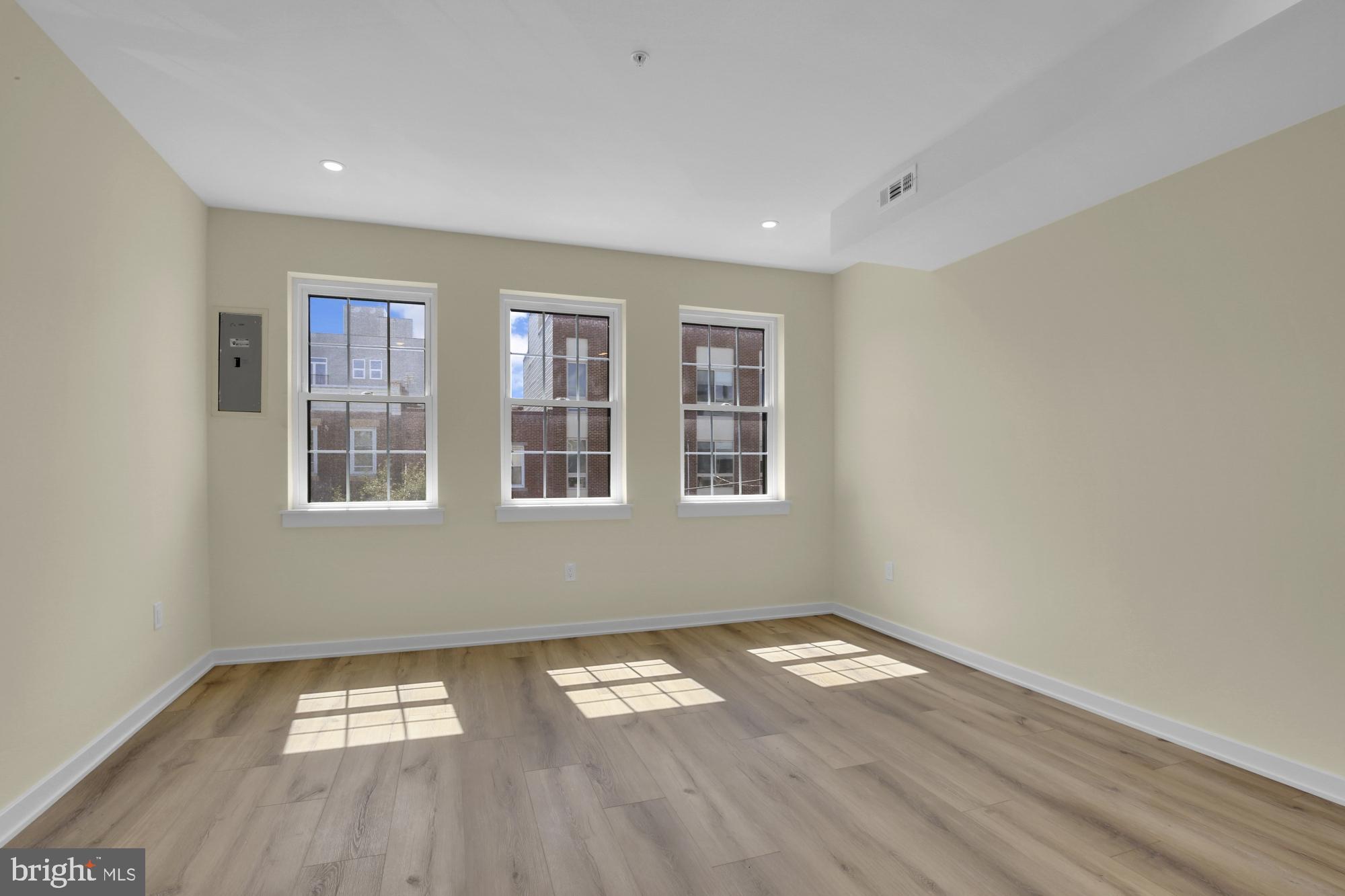 2670 Braddock Street Philadelphia, PA 19125 - Photo 27 of 47 a view of empty room with wooden floor and fan
