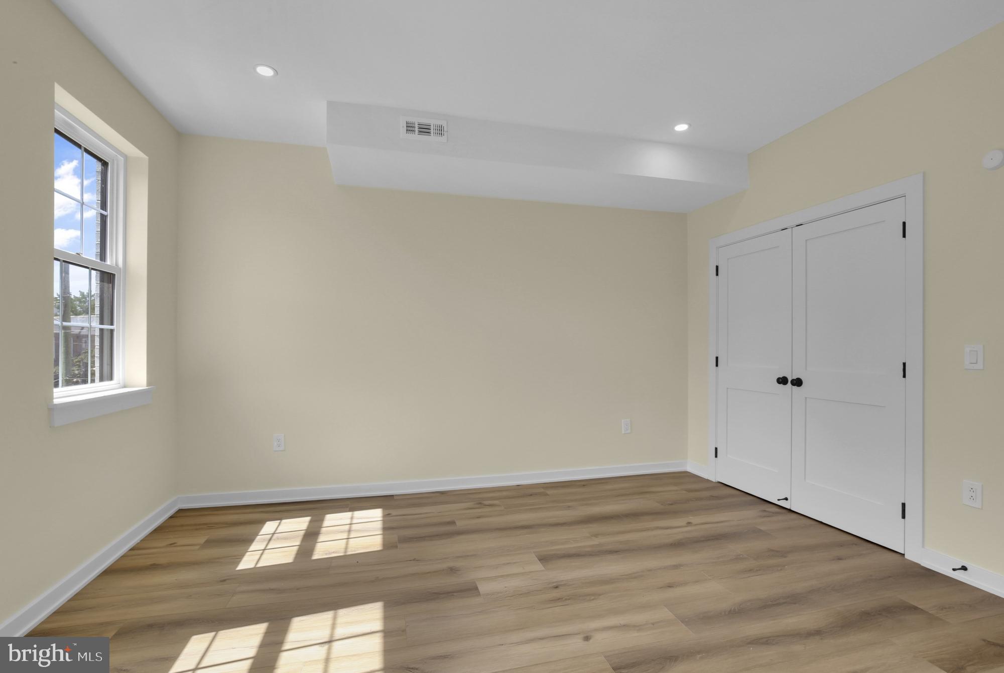 2670 Braddock Street Philadelphia, PA 19125 - Photo 28 of 47 a view of empty room with wooden floor and fan
