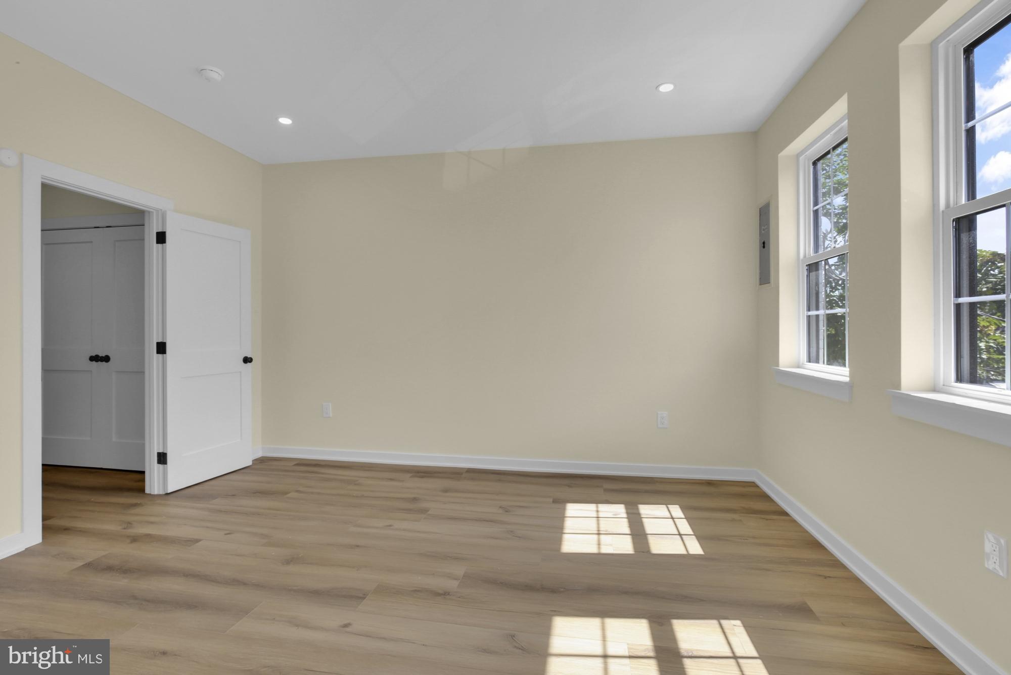 2670 Braddock Street Philadelphia, PA 19125 - Photo 29 of 47 wooden floor in an empty room with a window