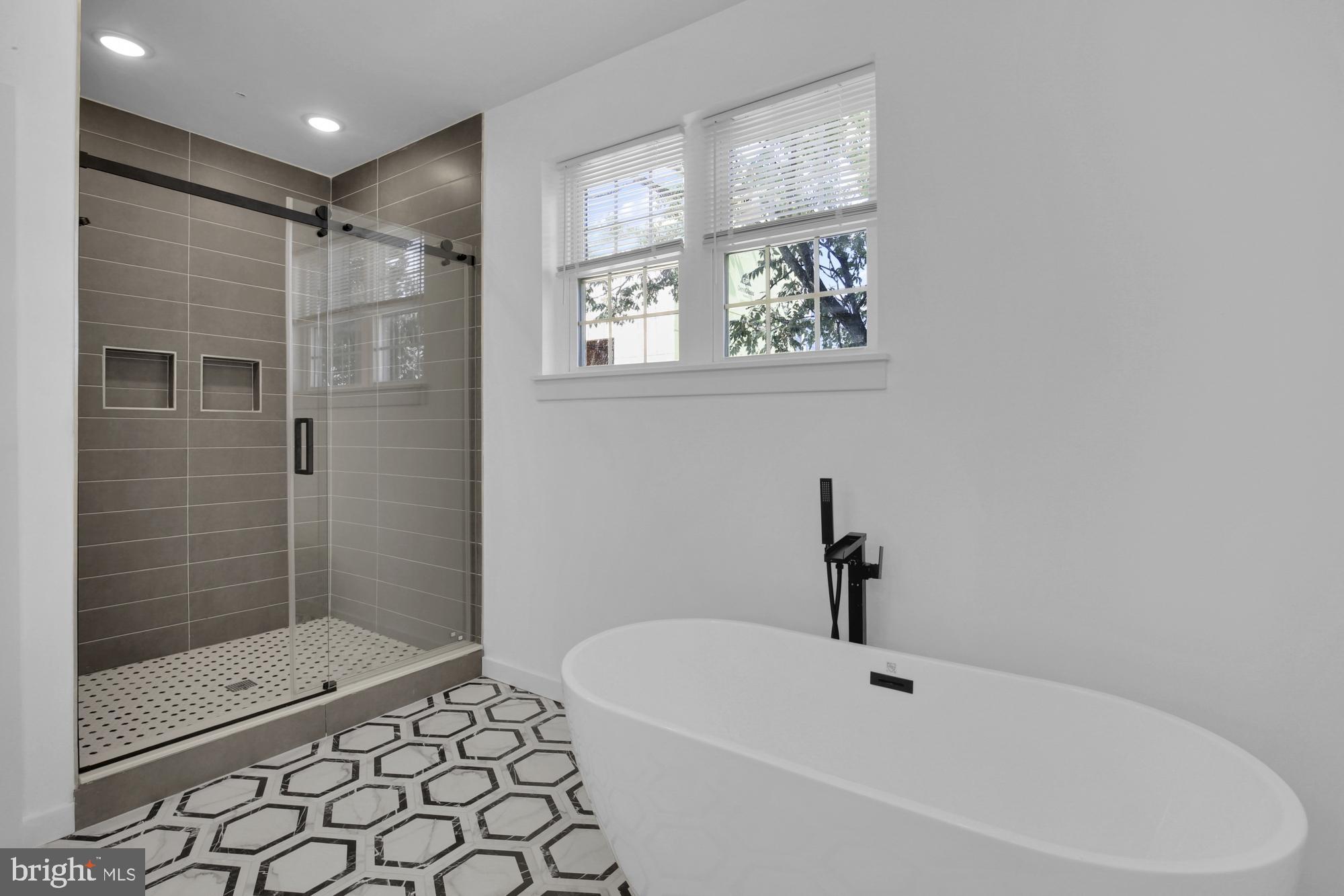 2670 Braddock Street Philadelphia, PA 19125 - Photo 39 of 47 a bathroom with a bathtub and shower