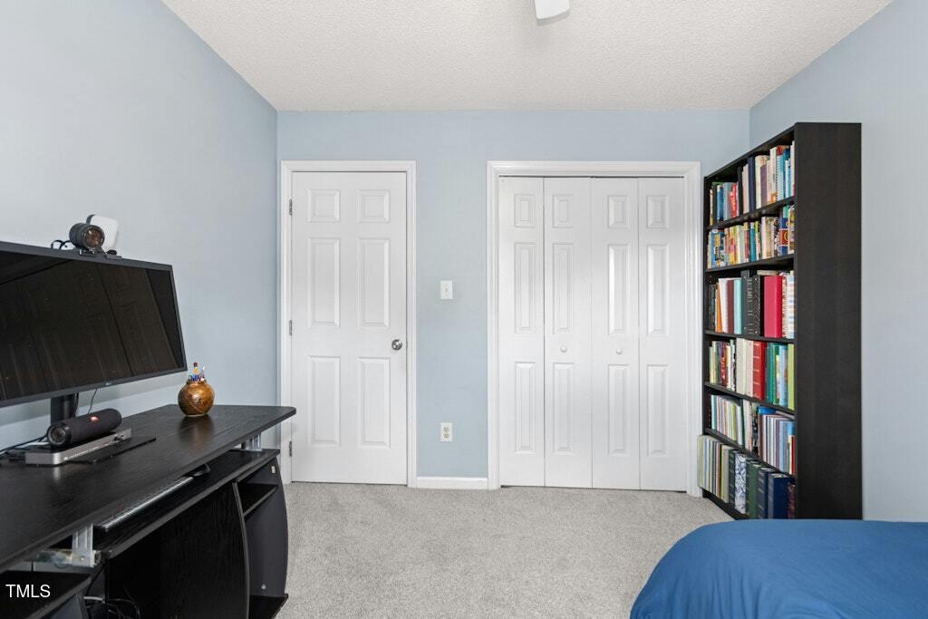 2342 School Creek Place Raleigh, NC 27606 - Photo 24 of 41 a view of room with workspace and a window