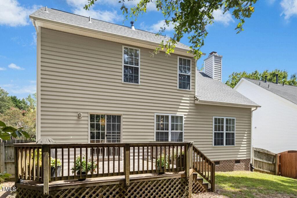 2342 School Creek Place Raleigh, NC 27606 - Photo 31 of 41 a view of a house with a deck