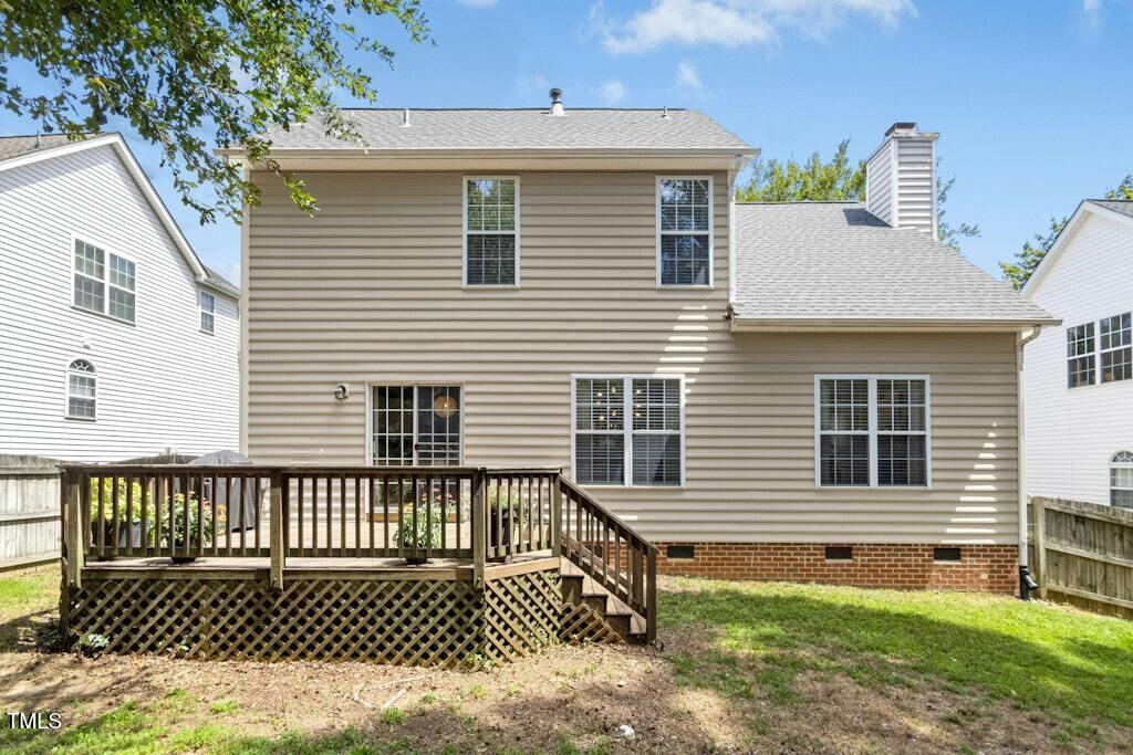 2342 School Creek Place Raleigh, NC 27606 - Photo 33 of 41 a view of a house with a wooden deck