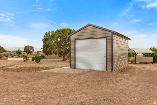 2925 Juniper Road Enterprise, UT 84725 - Photo 40 of 56 Detached garage featuring dirt driveway