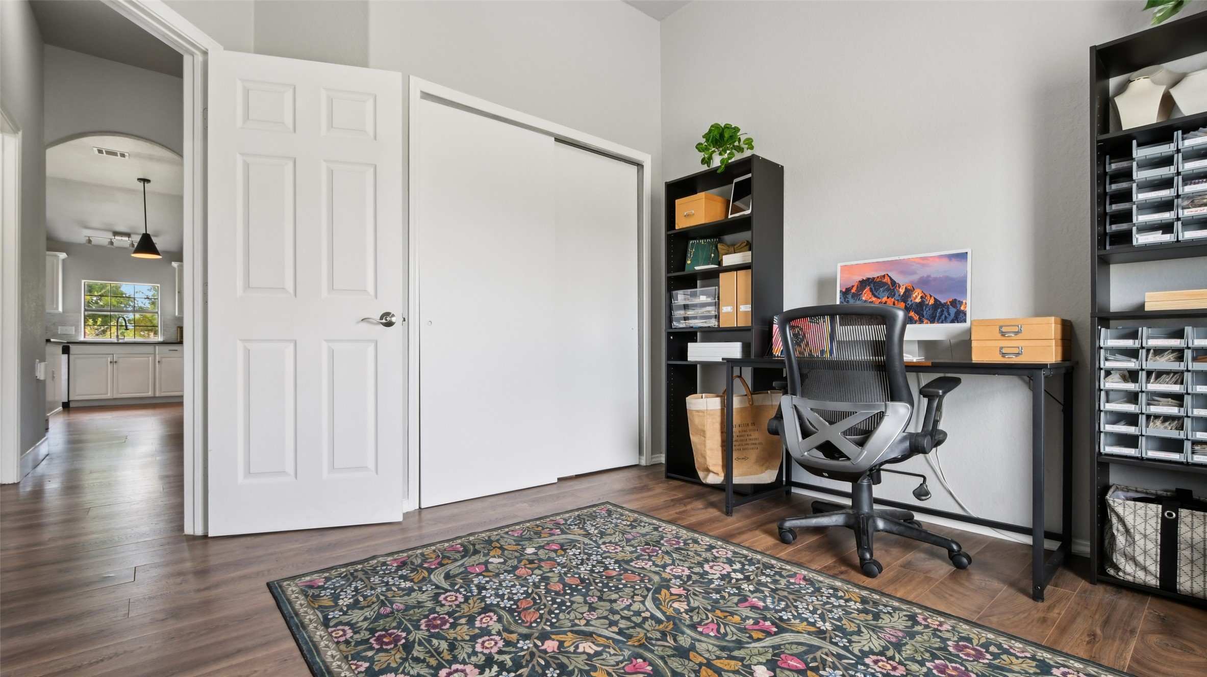 13131 Crane Road Buda, TX 78610 - Photo 12 of 18 a view of a workspace with furniture and a window