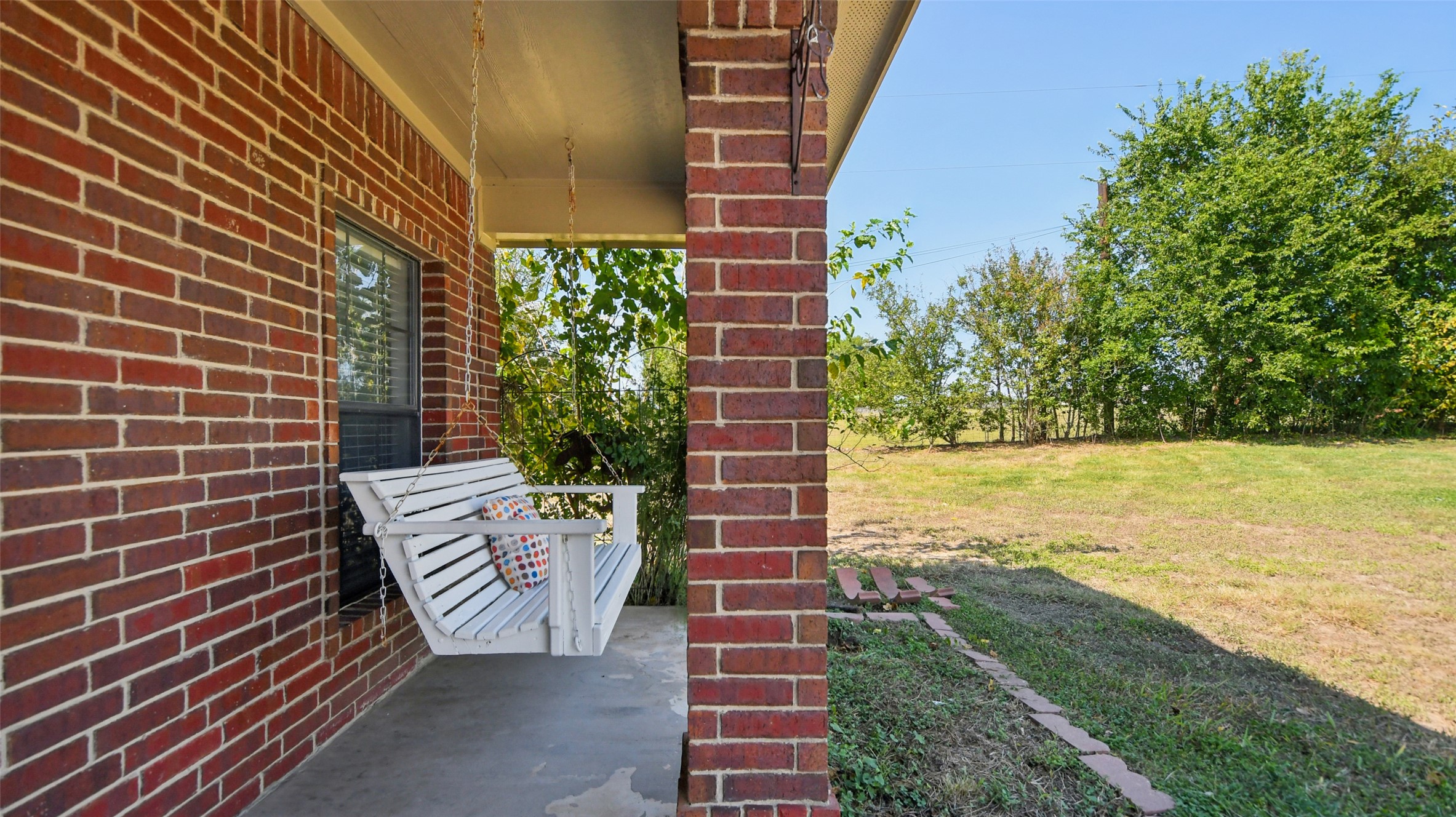 13131 Crane Road Buda, TX 78610 - Photo 4 of 18 a view of a backyard with chairs