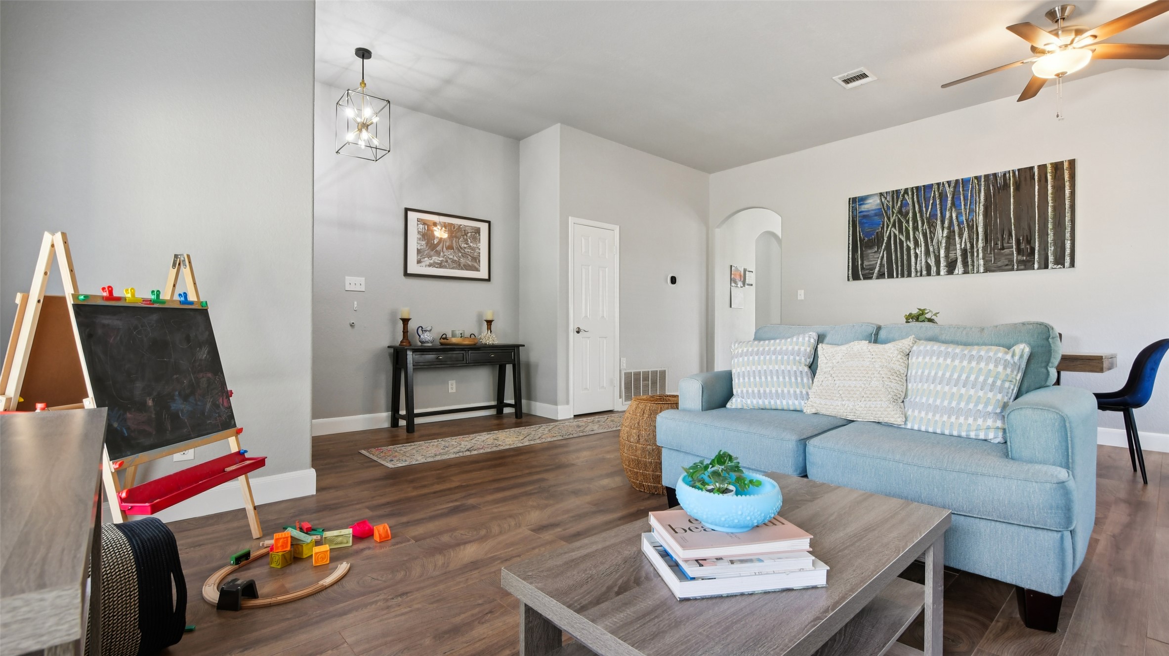 13131 Crane Road Buda, TX 78610 - Photo 5 of 18 a living room with furniture and a table