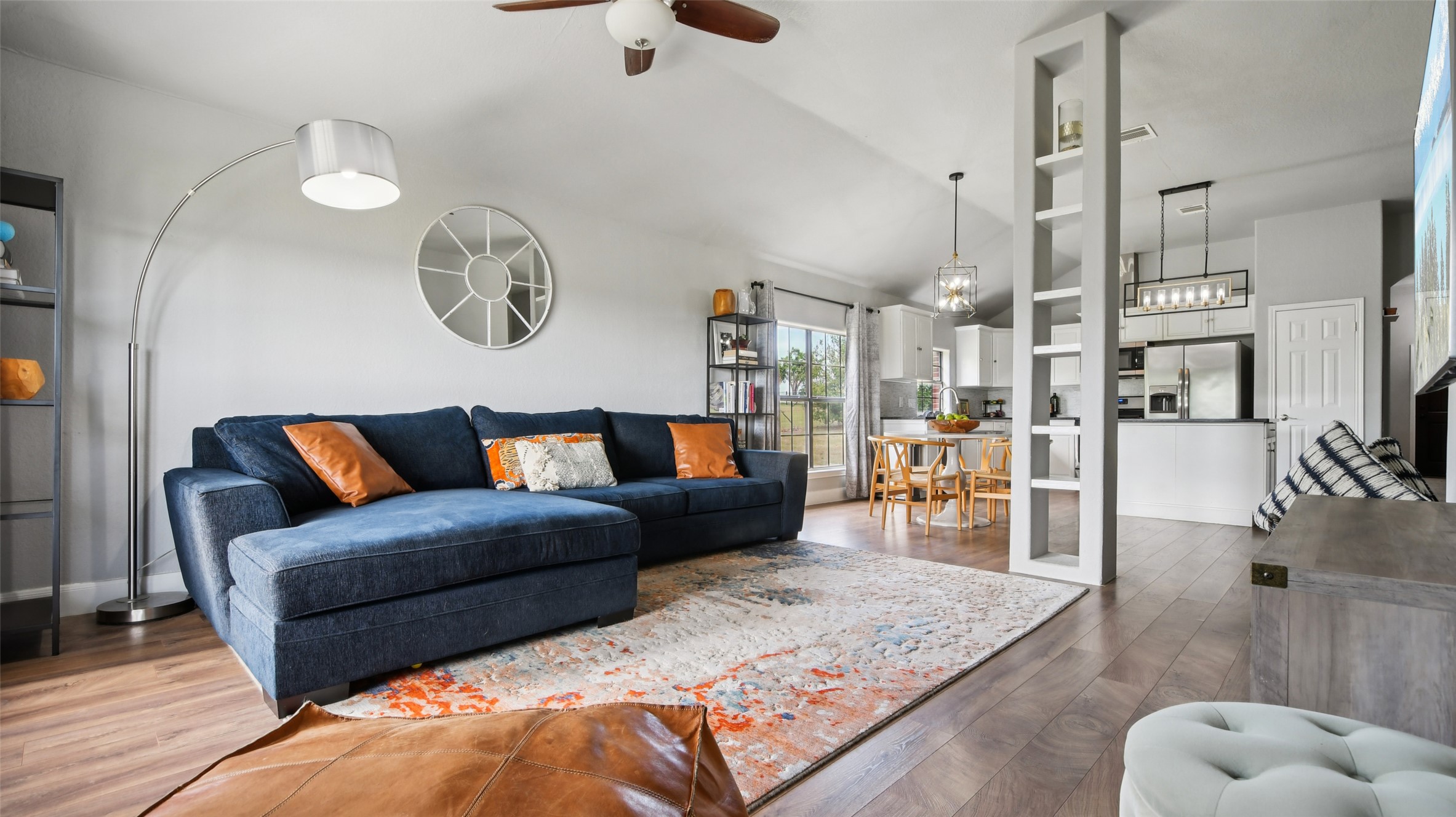 13131 Crane Road Buda, TX 78610 - Photo 7 of 18 a living room with furniture kitchen view and a table