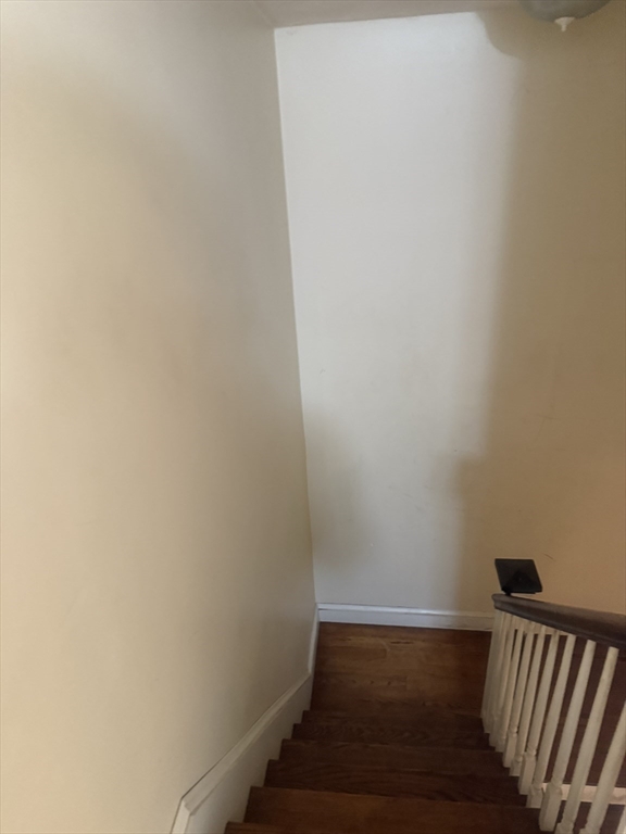 82 2nd Street Medford, MA 02155 - Photo 14 of 23 a view of wooden floor with a window