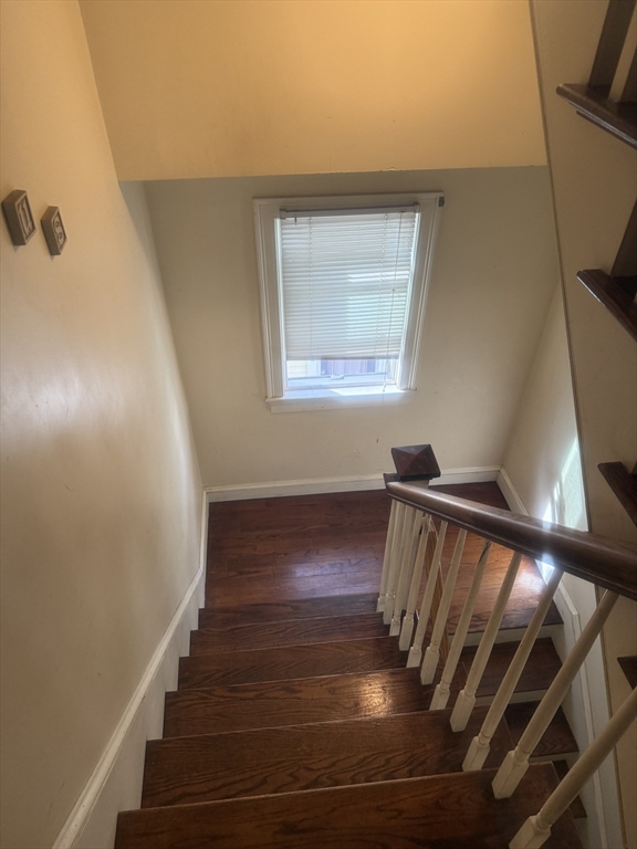 82 2nd Street Medford, MA 02155 - Photo 21 of 23 a view of entryway with wooden floor