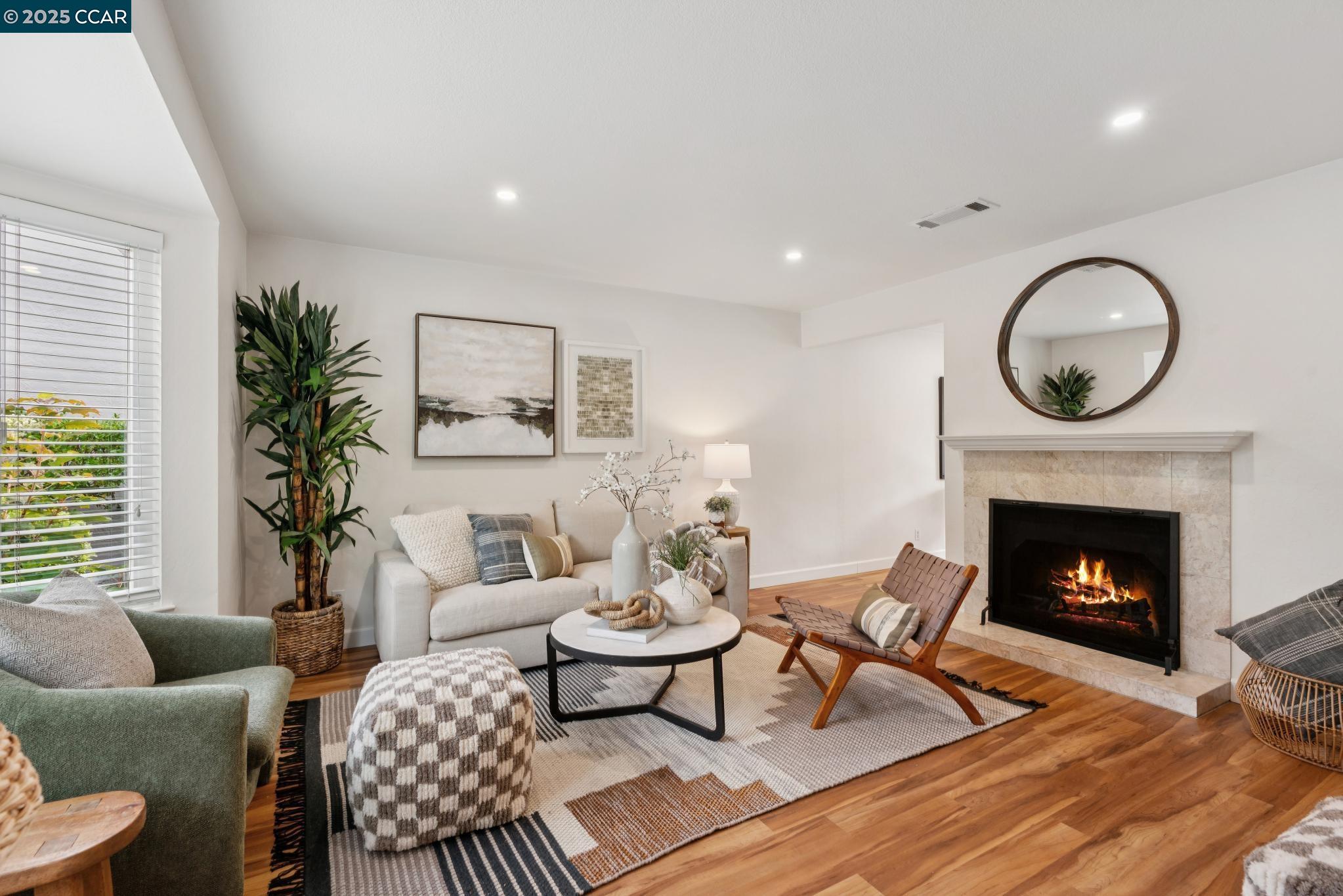 46 Sierra Lane Walnut Creek, CA 94596 - Photo 1 of 31 a living room with furniture a window and a fireplace