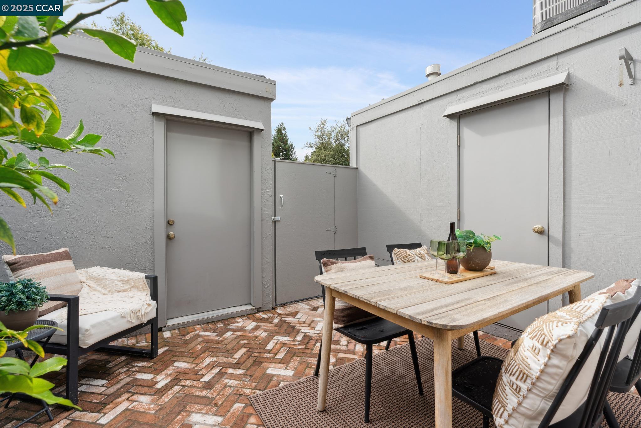 46 Sierra Lane Walnut Creek, CA 94596 - Photo 12 of 31 a view of a patio with a table and chairs