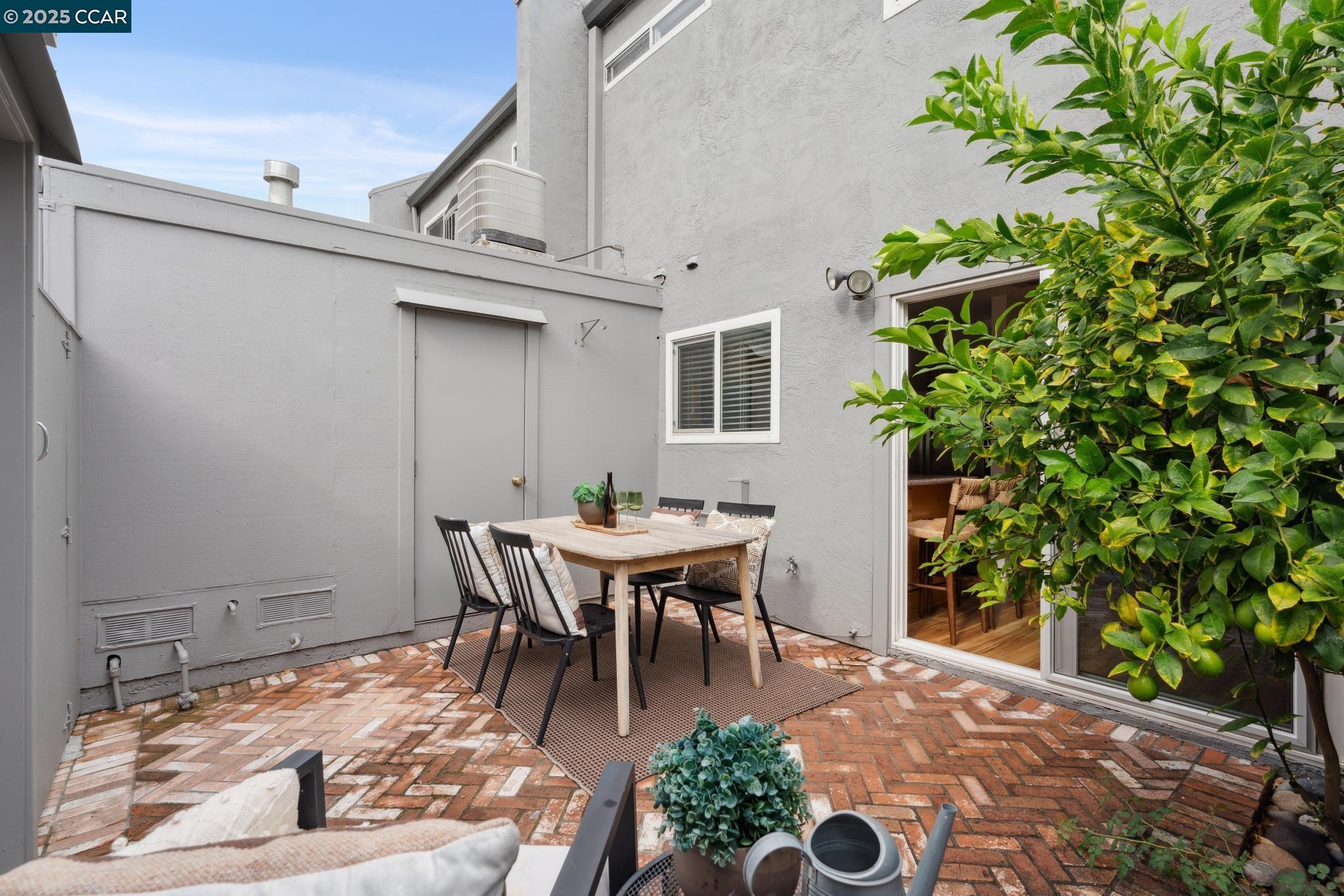 46 Sierra Lane Walnut Creek, CA 94596 - Photo 14 of 31 a backyard of a house with a table and chairs
