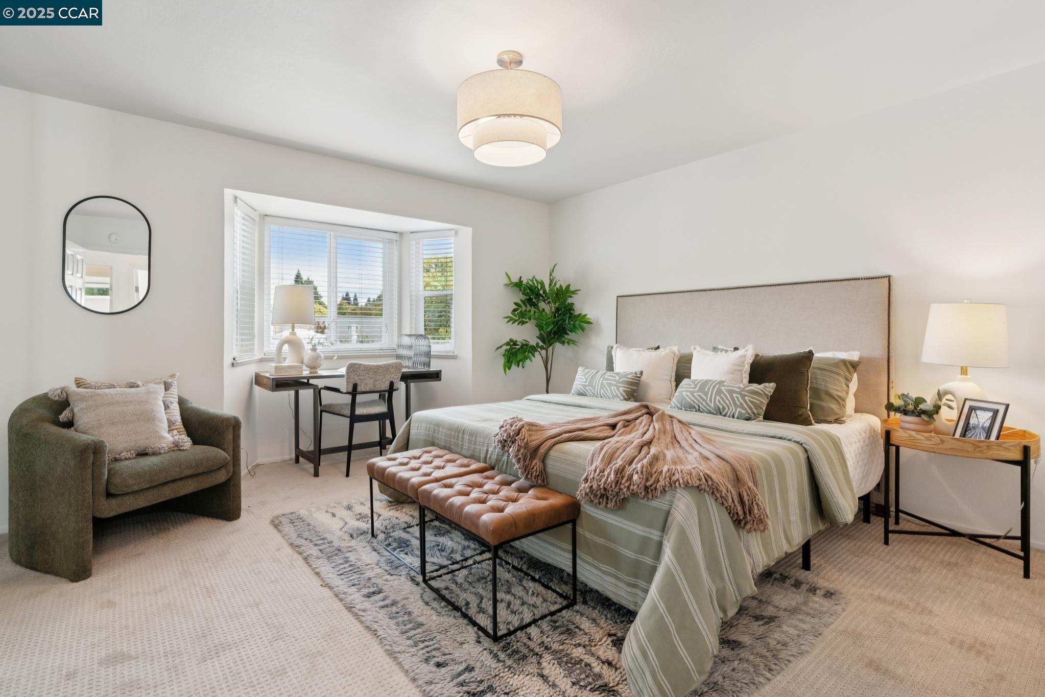 46 Sierra Lane Walnut Creek, CA 94596 - Photo 15 of 31 a bedroom with bed and a chandelier