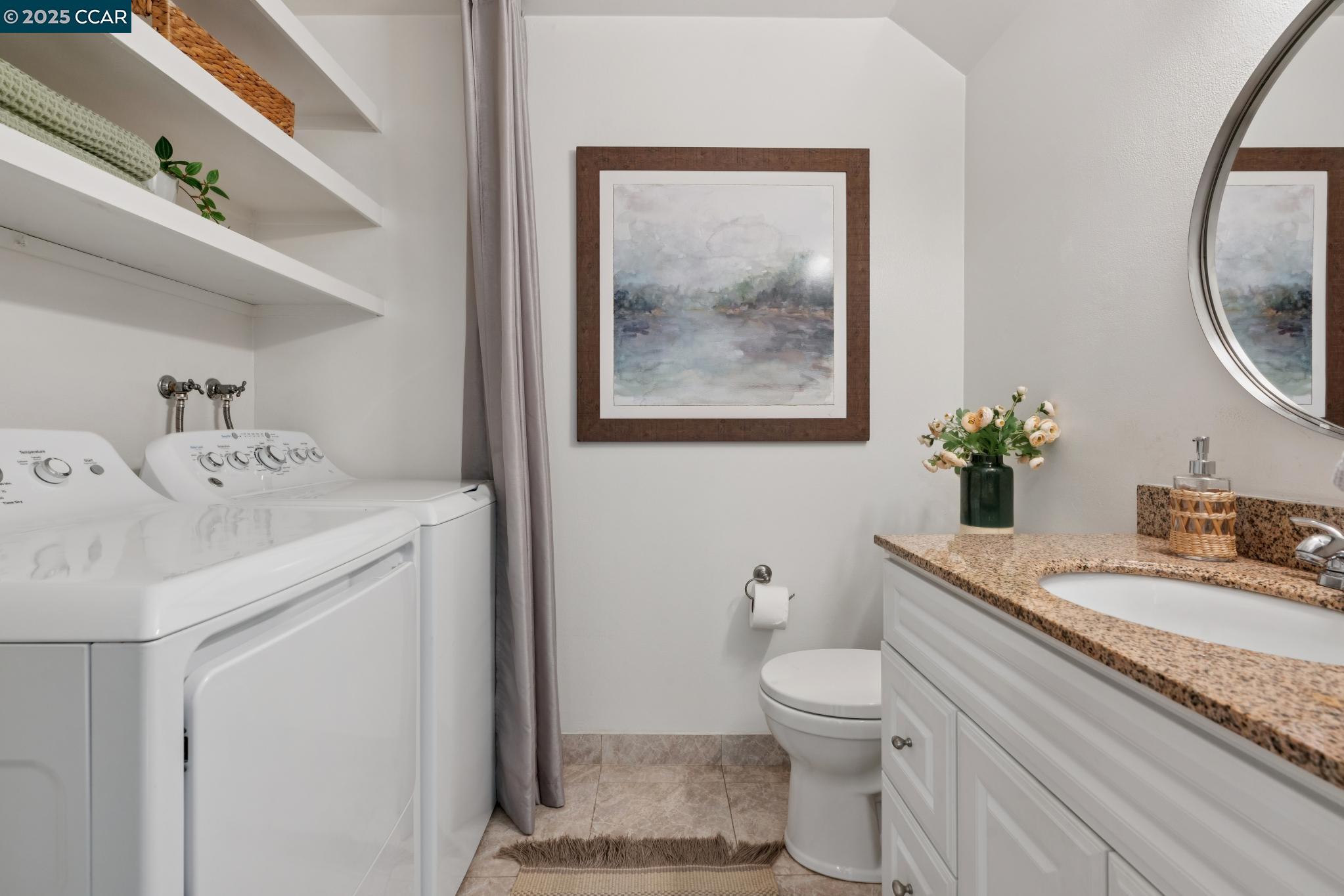 46 Sierra Lane Walnut Creek, CA 94596 - Photo 23 of 31 a bathroom with a sink a toilet and a mirror