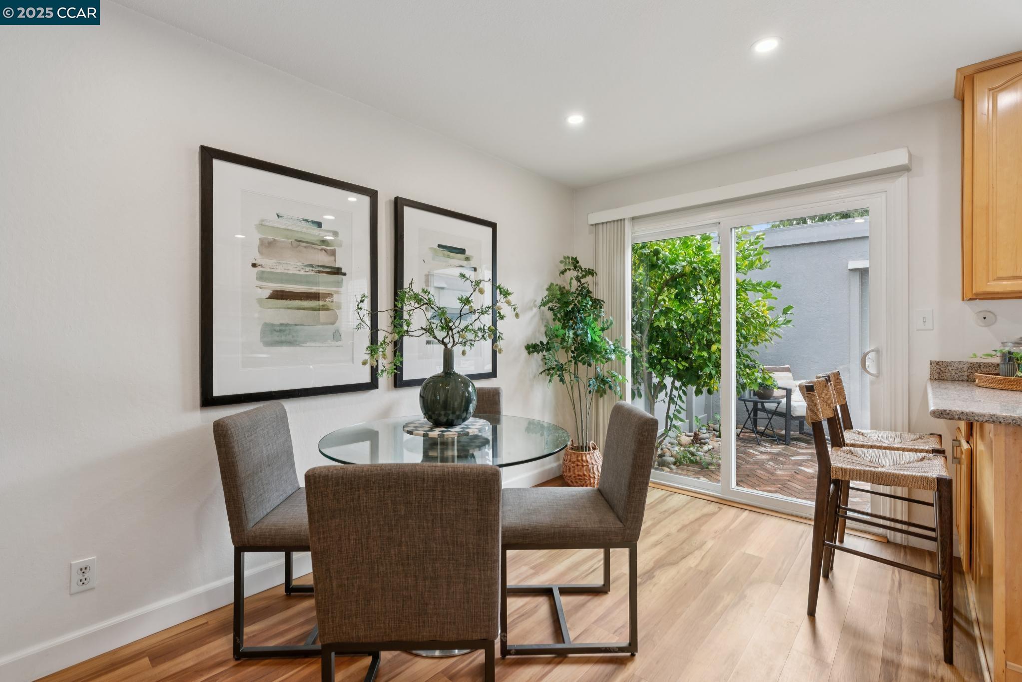 46 Sierra Lane Walnut Creek, CA 94596 - Photo 5 of 31 a dining room with furniture and wooden floor