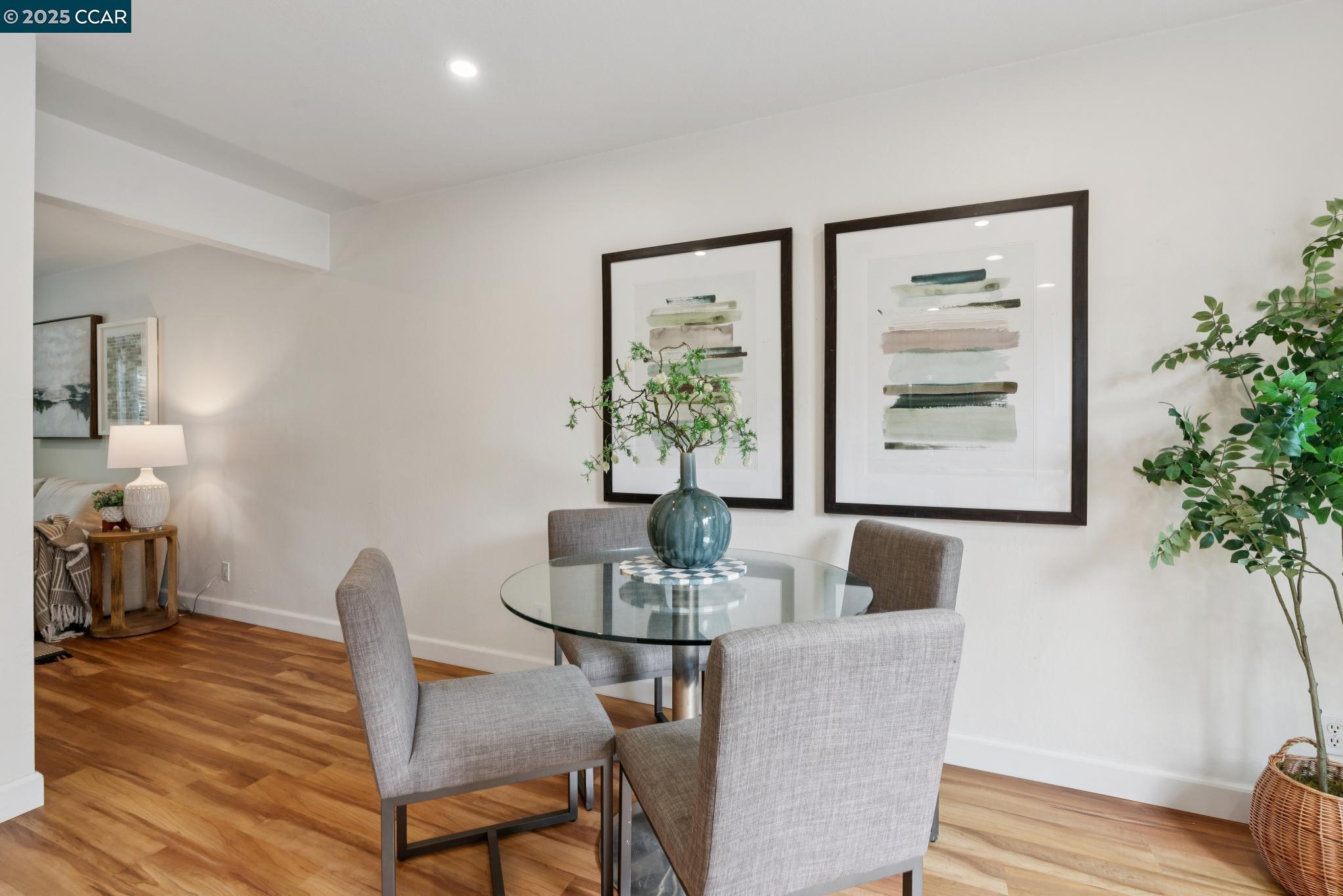 46 Sierra Lane Walnut Creek, CA 94596 - Photo 7 of 31 a view of a dining room with furniture and wooden floor