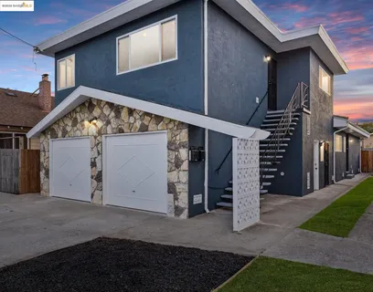 a view of a house with a garage