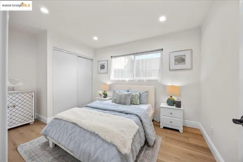 a view of hallway with wooden floor