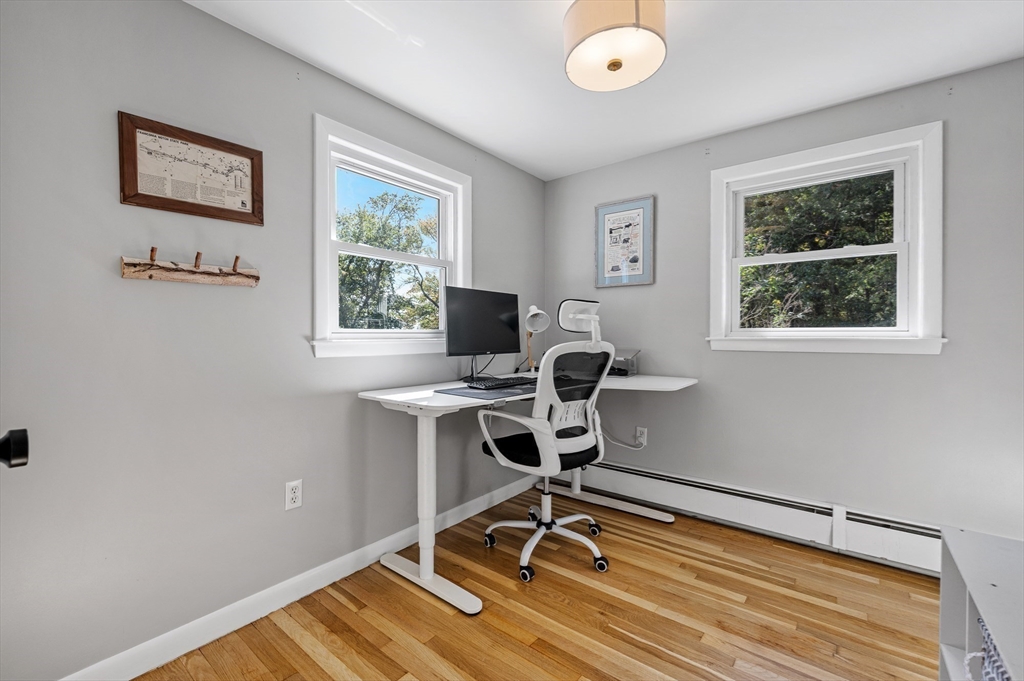 92 Dodge Hill Road Sutton, MA 01590 - Photo 21 of 33 a view of a workspace with furniture and a window