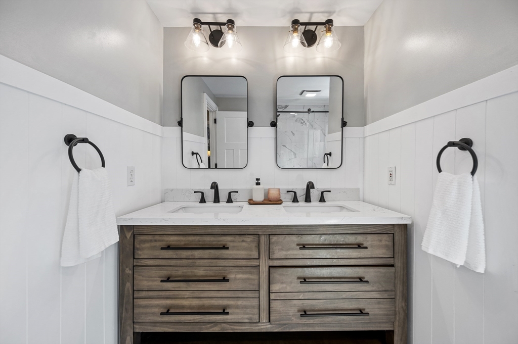 92 Dodge Hill Road Sutton, MA 01590 - Photo 23 of 33 a bathroom with a sink vanity and a mirror