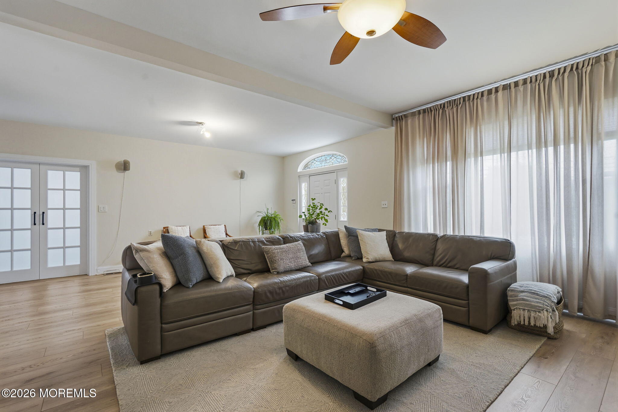 438 Bennetts Mills Road Jackson, NJ 08527 - Photo 6 of 42 a living room with furniture and a large window