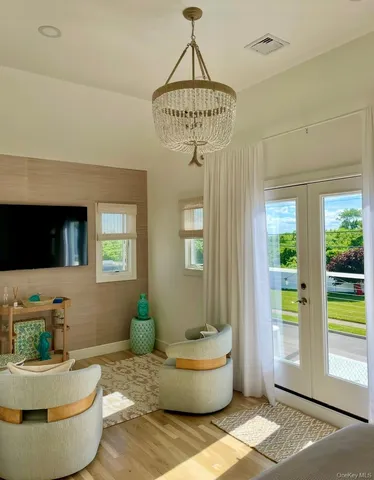 a dining room with a couch and a table