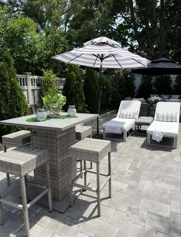 a view of yard with seating space