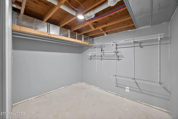 a view of a room with racks on the wall