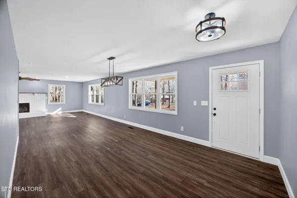 a view of livingroom with hardwood floor and window