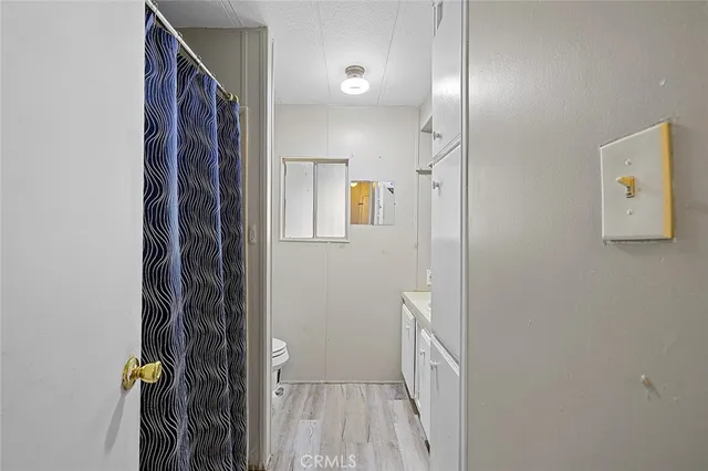 a view of hallway with shower