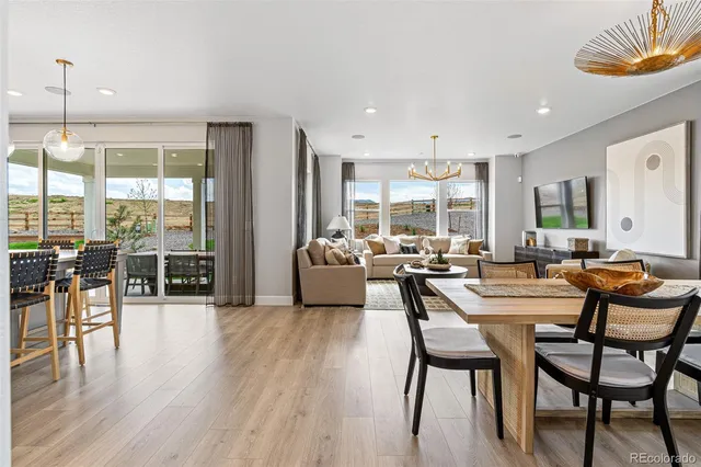 a view of a room with furniture window and wooden floor