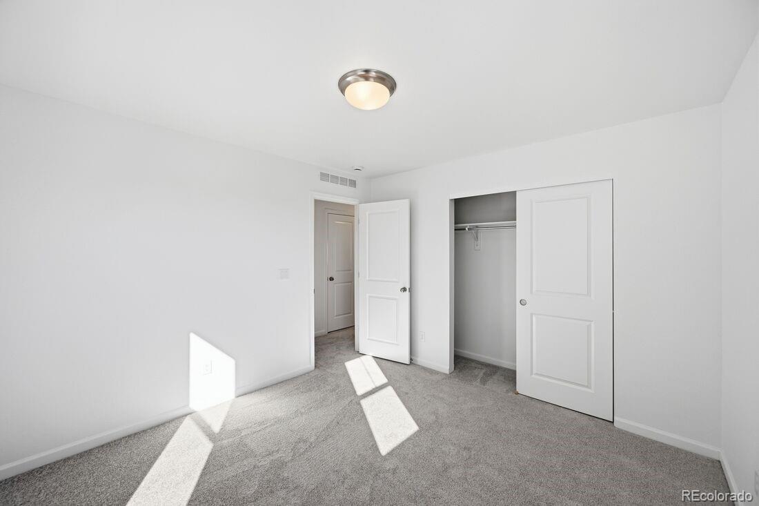 16857 West 92nd Loop Arvada, CO 80007 - Photo 20 of 31 a view of an empty room