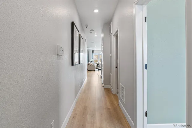 a bedroom with a bed and a table